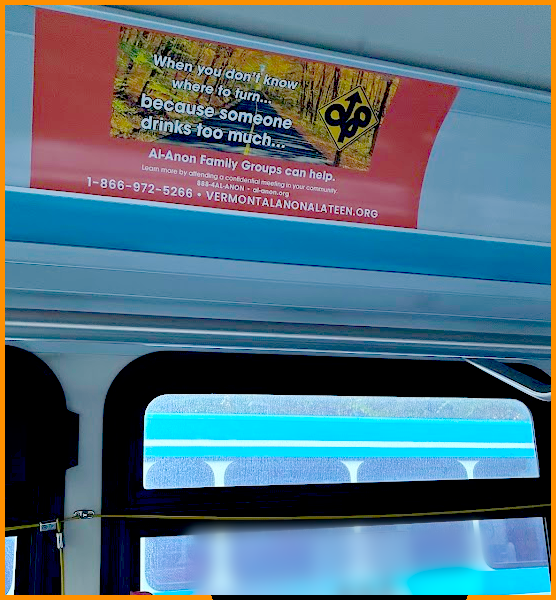 inside of a bus with the al-anon poster:When you don't know where to turn because someone drinks too much al-anon family groups can help.